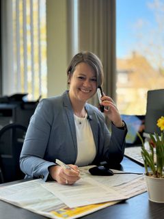 Hoteldirektorin am Telefon