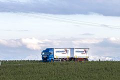 GRIESHABER LKW Panoramaaufnahme zwischen Feld und Wolken 