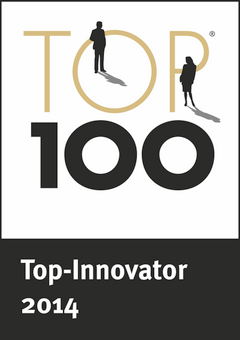 Grafik mit der Aufschrift „TOP 100“ in großen Buchstaben, ergänzt durch zwei schwarze Personensilhouetten auf den Buchstaben. Im unteren dunklen Bereich steht der Text „Top-Innovator 2014“.